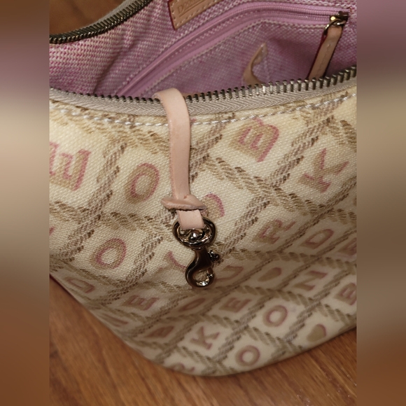 Dooney & Bourke Coated Canvas Signature Logo Charm Bucket Bag, Ivory - Picture 9 of 12